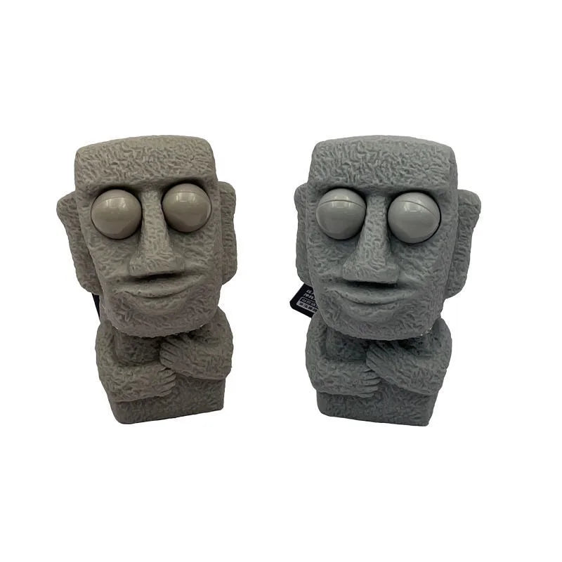 Stone man releases stress toy slowly rebounds soft Moai statue squeeze